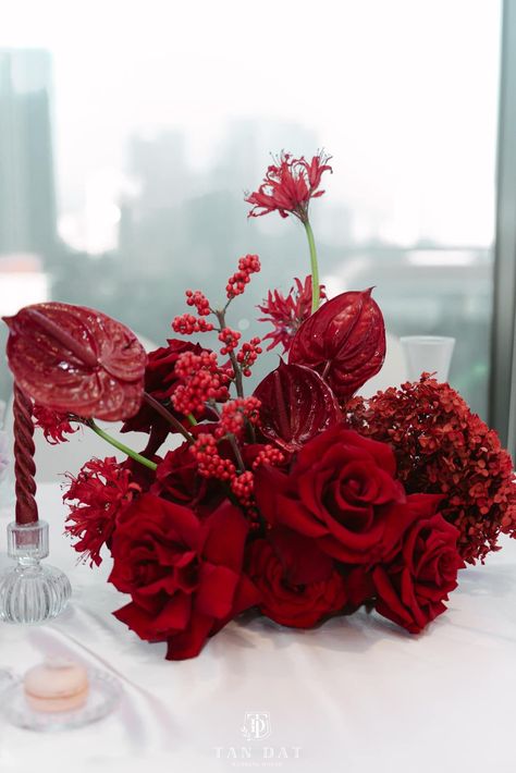 All Red Floral Arrangements, Modern Red Centerpieces, Red Floral Table Arrangements, Red Orchids Flower, Red Engagement Party Decorations, Anthurium Table Arrangement, Christmas Flower Installation, Red And Black Dinner Table Decor, Red Anthurium Centerpiece