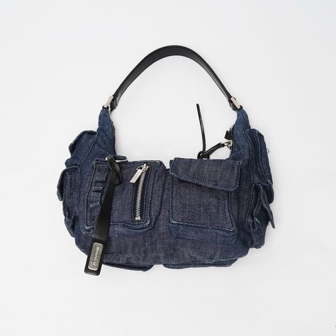 SOLD We sourced this dream bag so you don’t have to. The one and only @jilsander SS 2003 cargo denim mini bag that’s been featured in the season’s ad campaign (see slide 2) and that’s been an inspiration for some current designer bags (we’ll leave the guessing here to you). Multi pocket design made of denim with black cotton lining featuring the jil sander logo Fits perfectly underarm Leather strap and leather strap appliqués Silver toned zip closure and silver toned Jil Sander logo badge ... Cargo Bag, Black Mini Bag, Dream Bag, Logo Badge, Curated Vintage, Ad Campaign, Denim Mini, Jil Sander, Black Mini