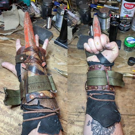 Wasteland Gladiator wrist guard. Leather, screws, wire, parachute harness and a GI tent stake Parachute Harness, Post Apocalyptic Armor, Apocalypse Armor, Zombie Apocalypse Gear, Apocalypse Costume, Armadura Ninja, Apocalypse Survival Gear, Apocalypse Gear, Zombie Apocolypse