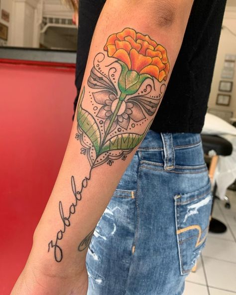 Marigold Hummingbird Tattoo, Marigold Tattoos, Traditional Tattoo Elbow, Marigold Tattoo, Baby Tattoo, Back Of Shoulder Tattoo, Marigold Flower, Tattoo Designs And Meanings, Baby Tattoos