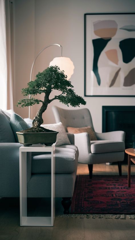 🌿✨ Is there anything more calming than a beautifully styled living room? 😍 I recently transformed my space with a touch of IKEA magic, featuring a stunning bonsai that has truly become the centerpiece of my home. Positioned elegantly on a sleek white Lack side table beside my cozy Ektorp armchair, this little tree brings a sense of tranquility and life into the room. 🪴💖 Bonsais are not just beautiful; they also offer incredible benefits! Did you know that having plants indoors can improve ... Bonsai Aesthetic, Bonsai Living Room, Ektorp Armchair, Tranquil Living Room, Stockholm Rug, Lack Side Table, Room Oasis, Ikea Inspired Living Room, Ikea Style