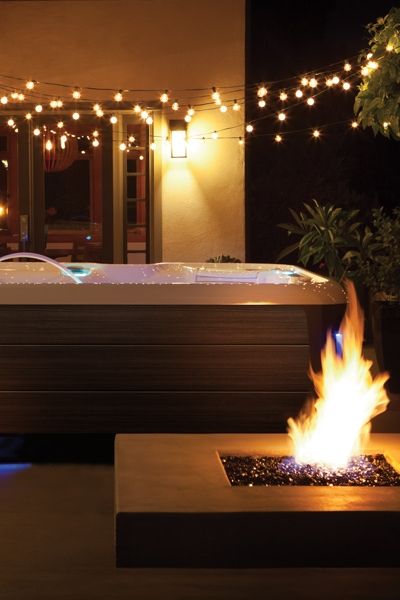 String Lights✨ + Hot Tub💦 + Fire Pit🔥 = the PERFECT backyard set up!  What does your dream backyard look like? String Lights Above Hot Tub, Lights Around Hot Tub, Hot Tub Fairy Lights, Hot Tub Off Master Suite, Lights Over Hot Tub, Hot Tub Fire Pit Combo, Hot Tub Lighting Ideas, Hot Tub Set Up, Hot Tub Lighting