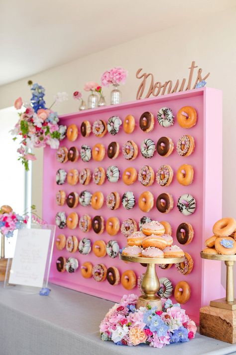 Flower walls might have been the hottest thing to have at your wedding in 2014, but there's something just as beautiful — but way more delicious — blowing up right now. Meet the donut wall: They've been popping up in our Instagram feeds over the last few months and we couldn't be happier about it. The best part? Donut walls are adaptable for any style of wedding. Here, they're super romantic. Click through for more ideas for recreating the donut wall trend. Donut Walls, Pastel Cupcakes, Wedding Donuts, Donut Bar, Flower Walls, Donut Birthday Parties, Wall Inspiration, Donut Wall, Instagram Feeds