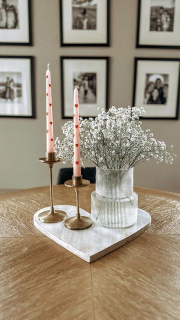 Ashley Alonzo on Instagram: "Simple Valentine dining table decor using a heart serving platter. 💕 Happy Friday Eve Friends! . Heart Candles from: @homegoods . #simpleisbeautiful #simpleisbetter #diningtables" Organic Valentines Decor, Valentines Day Dining Room Table Decor, Round Table Valentine Decor, Coffee Table Valentines Day Decor, Valentine Kitchen Table Decor, Valentines Decor For Restaurant, Valentines Decor Mantle, Minimal Valentines Decor, Simple Valentine’s Day Decor