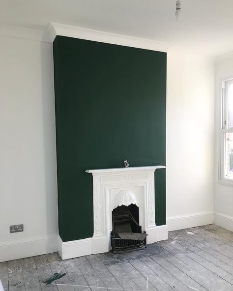 G R E E NNo filter friggin required! Here is my green chimney breast 😬! I was so nervous to put it on (thinking I might have made a total F* up on this paint decision) but after a few rolls, I bloody loved it! The fireplace will now stay white 🙌🏻 (which originally was painted white as a mistake by my dad 😮, but I think that was meant to be). I hope you guys like it. The paint is made by @paintandpaperlibrary and is called Hunter Dunn. #myhousethismonth #revamprestylereveal #greenroom #greenb Green Chimney Breast, Victorian House Bedroom, Green Chimney, Cream Living Room Decor, Black Fireplace Wall, Fire Feature Wall, Chimney Decor, Green Couch Living Room, Green Living Room Decor