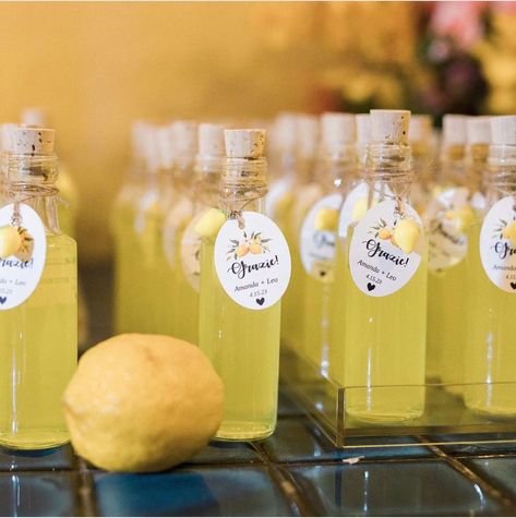 File this under "Wedding Favors Your Guests Won't Toss!" 🍋 Gifting your guests with delicious homemade Limoncello is such a fun idea. Limoncello Favors Mini Bottles, Lemon Tree Wedding Arch, Positano Theme Flowers, Limoncello Bottles Wedding Favours, Mini Limoncello Bottles, Limoncello Labels Printable Free, Lemoncello Bridal Shower Ideas, Positano Bridal Shower Theme, Positano Theme Party