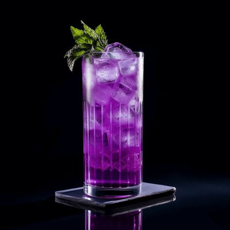 The Purple Passion is a sweet, fruity cocktail. It has a vibrant, tangy taste with a hint of citrus. The cocktail is light and refreshing, making it a great choice for a hot summer day. Purple Cocktails Recipe, Purple Passion Drink, Fish Bowl Recipe, How To Make Purple, Fruity Alcohol Drinks, Orange Liquor, Purple Cocktails, Purple Drinks, Soda Brands