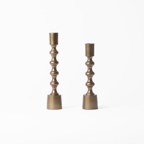 Create a unique and eye-catching space with the Celeste Taper Holder. This sleek and modern taper candle holder is perfect for styling any space, adding a sculptural element that is both intriguing and sophisticated. With its elegant design, it will effortlessly enhance the ambiance of any room. Dimensions:Small: 8"H x 2"WMedium: 9.5"H x 2"WMaterial: Aluminum Taper Holders, Taper Candle Holder, Creative Co Op, Taper Candle Holders, Room Dimensions, Taper Candle, Candle Holder, Elegant Design, Candle Holders