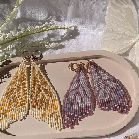 Lila🦋 on Instagram: "FAIRY WINGS AVAILABLE NEXT FRIDAY✨🧝🏾‍♀️🧚🏽🦋 There will be about 6 pairs available for purchase on the 7th! Save my sale reminder so you don’t miss out! #beadwork #beadedjewelry #beadedearrings #handmadejewelry #handmadeearrings #smallbusinesssupport #jewelryaddict #earringsoftheday #fairywings #fairyearrings #handmadejewelry #handmadeearrings #beadworkforsale" Butterfly Earrings Diy, Beaded Butterfly Earrings, Seed Bead Projects, Bead Loom Designs, Next Friday, Gold Bead Earrings, Loom Jewelry, Seed Beading, Beaded Earrings Patterns