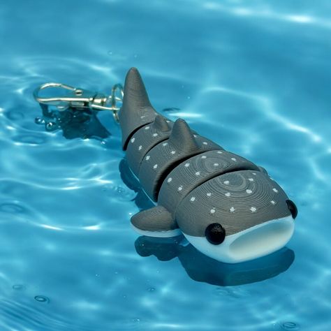 Add a splash of charm to your bag with this 3d printed whale shark bag charm! Stand out in a sea of ordinary accessories and let the quirky design make a statement. Perfect for the ocean lover in all of us. (Warning: may attract real whale sharks (!) - use with caution). Length - 3 1/2" Whale Shark Decor, Shark Whale, Shark Merch, Shark Things, Shark Items, Shark Stuff, Whale Shark Plush, Shark Lover Gifts, Cute Shark Accessories