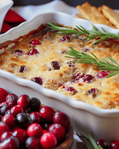 Baked Cranberry Cream Cheese Dip: The Perfect Festive Appetizer Introduction Looking for a delicious, warm, and crowd-pleasing appetizer that’s perfect for the holiday season? This Baked Cranberry Cream Cheese Dip ... Read more Cranberry Cream Cheese Dip, Cranberry Dip, Cream Cheese Recipes Dip, Cream Cheese Dip, Homemade Cranberry Sauce, Leftover Cranberry Sauce, Cranberry Cream Cheese, Cranberry Sauce Recipe, Cranberry Cheese