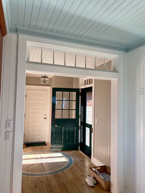 Cased Opening With Transom, Exterior Door With Transom Window, Transom Windows Interior, Stained Beam, Door Treatments, Dark Green Kitchen, Ceiling Details, Transom Window, Stone Accent Walls