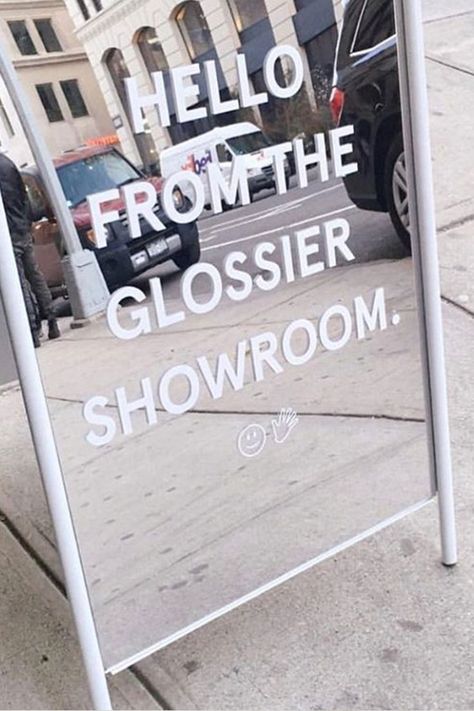 Glossier Branding, Glossier Showroom, Glossier Pop Up, Standing Signage, Glossier Beauty, Branded Mirrors, Showroom Inspiration, Mirror Decals, Retail Signage