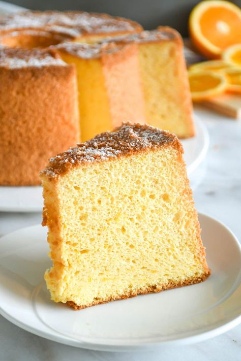 Tender, fluffy and rich with citrus flavours, orange chiffon cake is a delightful treat! Loaded with loads of fresh juices and zest of oranges and lemons, this treat is tangy and not too sweet. Orange Chiffon Cake Recipe, Orange Sponge Cake, Orange Loaf Cake, Orange Chiffon Cake, Bolu Cake, Marble Cake Recipes, Fresh Juices, Orange Chiffon, Sponge Cake Recipes