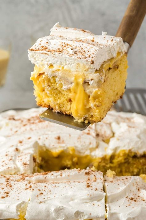 Get ready to indulge in the ultimate holiday dessert with this scrumptious eggnog poke cake. Perfect for Christmas, this yummy treat has layers of soft vanilla cake soaked in rich eggnog pudding and finished off with a light, fluffy whipped topping. The mix of flavors and textures is simply irresistible, and I guarantee your guests will be coming back for more. Whether you’re throwing a festive gathering or just in the mood for something special, this eggnog poke cake is an absolute must-try. Eggnog Poke Cake, Eggnog Pudding, Soft Vanilla Cake, Eggnog Cake, Christmas Eggnog, Pudding Poke Cake, Poke Cake Recipes, Warm Cake, Roast Chicken Recipes