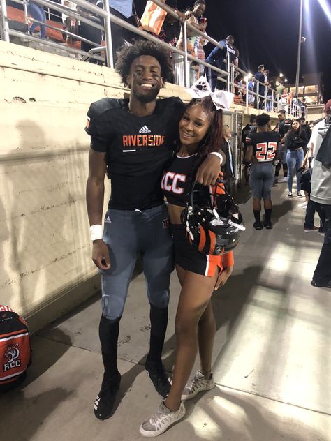 Cheerleader Girlfriend Football Boyfriend, Black Couple Football Pictures, High School Black Couples Goals, Football Cheerleader Couple Black, Cheerleading And Football Couples, Black School Couples, Cheerleader Gf And Football Bf, Cheer Gf And Football Bf, Cheerleader And Basketball Player Couple