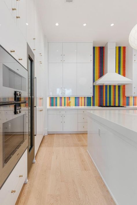 White Glossy Cabinets + Mosaic Rainbow Tile Backsplash Rainbow Backsplash, Multicolor Tile Backsplash, Multicolor Backsplash, Rainbow Backsplash Kitchen, Rainbow Tiles Bathroom, Rainbow Tile Backsplash, White Soapstone, Curved Couch, Rainbow Tile