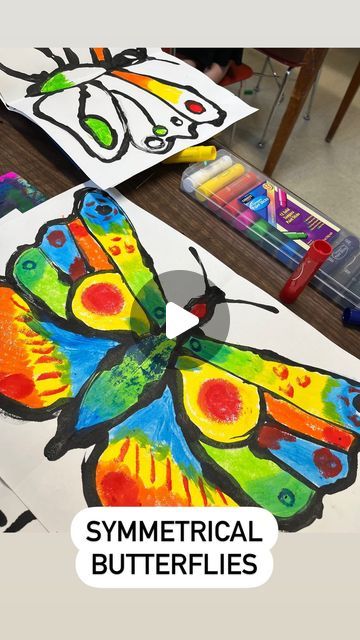 Savanna🎨 on Instagram: "Symmetrical butterflies with kindergarten! This was a fun one that the kiddos loved- and it gave them some knowledge of life cycles, symmetry, paint skills, patterns and colors in nature, and much more!   #artforkids #artwithkids #kindergartenart #artistsatwork #workinprogress #elementaryart #elementaryartclass #elementaryartteachers #elementaryteacher #artteachers #artteacher #artteachersofinstagram #artteacherlife #animalart #shading #texture #animaldrawing #realisticdrawing #artworkoninstagram #artworkoftheday #butterflyart #butterflies #kinder  #artlesson #elementaryartlesson #springart" Symmetrical Butterfly Art For Kids, Pattern Art For Kindergarten, Butterfly Symmetry Painting, Symmetry Art Projects, Symmetry Art For Kids, Butterfly Cycle, Symmetrical Butterfly, Colors In Nature, Symmetrical Art