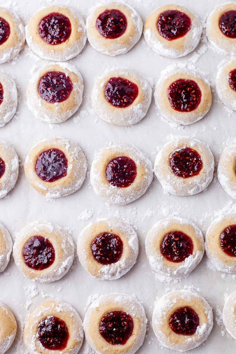 Classic Thumbprint Cookies are a flakey buttery shortbread cookie filled with your favorite jam and baked to perfection. A delicate outer cookie with chewy jam center. Old Fashion Thumbprint Cookies, Jolly Jammer Cookies, Pressed Butter Cookies, Best Thumbprint Cookies With Icing, Jam Filled Shortbread Cookies, Finger Print Cookies With Jam, Small Cookies Ideas, Jam Cookies Thumbprint, Cranberry Thumbprint Cookies