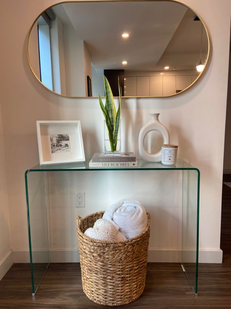 Entryway Ideas Glass Table, Entryway Table Apartment, Glass Table Entryway Decor, Entryway Glass Table Decor, Mirror Above Entry Table, Glass Entry Table Decor, Entry Table Apartment, Apartment Entry Table, Entry Way Apartment Decor