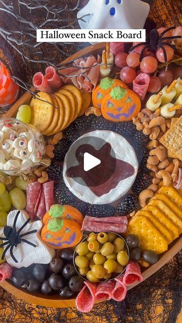 Alisha Larson on Instagram: "Halloween Snack Board 👻 Entertain your guests with all the snacks & cute touches of Halloween! 🎃

This serving tray is a MUST HAVE, comes in handy for every and ALL events & Holidays! 

Comment SNACK for a direct link for supplies used or shop LTK 24/7! 🫶

Snack Board Ideas:

✨Brie Cheese Cutout
✨Assorted meats
✨Assorted Crackers
✨Cookies
✨Fruits
✨Cheeses (String cheese broomsticks ☺️)
✨Mozzarella Pearls with candy eyeballs
✨Olives 
✨Nuts
✨Pepper Jelly or Strawberry preserves 

ENJOY! 😋

#snackboard #easyrecipes #charcuterieboard #halloweenideas #halloweeninspo #charcuterie #halloweenparty #hosting #hostingideas #snackideas" Fruit Halloween Tray, Cheese Broomsticks, Snack Board Ideas, Halloween Snack Board, Halloween Charcuterie, Mozzarella Pearls, Candy Eyeballs, Halloween Fruit, Halloween Snack