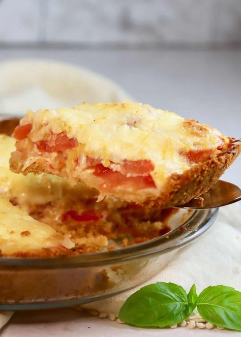 Easy Southern Tomato Pie is a savory tomato recipe full of fresh, sweet, ripe tomatoes with melted cheddar cheese and blanketed with a tangy mixture of mayonnaise, Dijon mustard, and parmesan cheese. This cheesy, tomatoey deliciousness is baked in a rich, buttery crust made with Ritz crackers. It's a versatile classic tomato recipe that can be served as a side dish or main dish for breakfast, brunch, lunch, or a light dinner. Make this easy recipe for your family today! Ritz Cracker Crust, Southern Tomato Pie, Tomato Pie Recipe, Hotdish Recipes, Onion Pie, Tomato Recipe, Ritz Cracker, Corned Beef Recipes, Fried Green