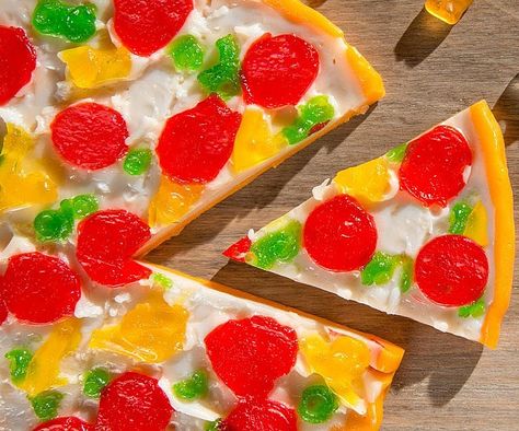 Give your pizza party the perfect ending by serving up some delicious slices of gummy pizza for dessert. Each pie measures 8 inches in diameter and comes with yummy fruit flavored toppings that all add up to a heavenly 1,300 calories of cavity spawning goodness. Gummy Pizza, Yummy Fruit, Dessert Pizza, 300 Calories, Pizza Slice, Pizza Party, Unique Gift Ideas, Fruit Flavored, Sweet Desserts