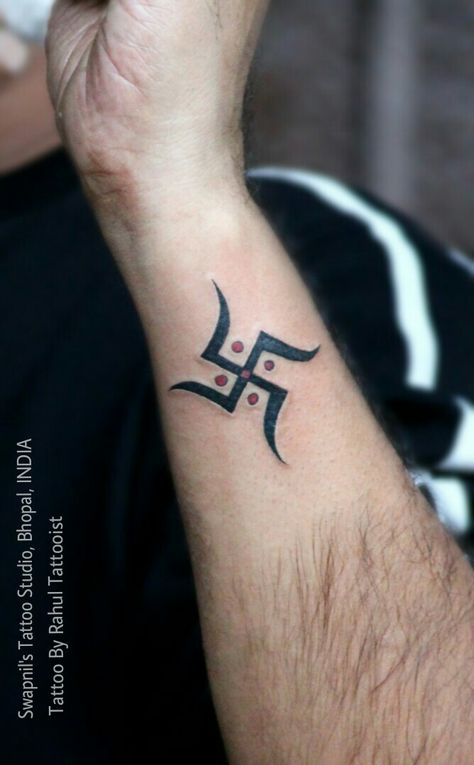 Swastik symbolic tattoo    Tattoo by Rahul Tattooist Om Swastik Tattoo, Swastik Design Tattoo, Swastik Tattoo, Tattoo Design Meaning, Swastik Symbol, Swastik Design, Trishul Tattoo Designs, Faith Tattoo On Wrist, Believe Tattoos