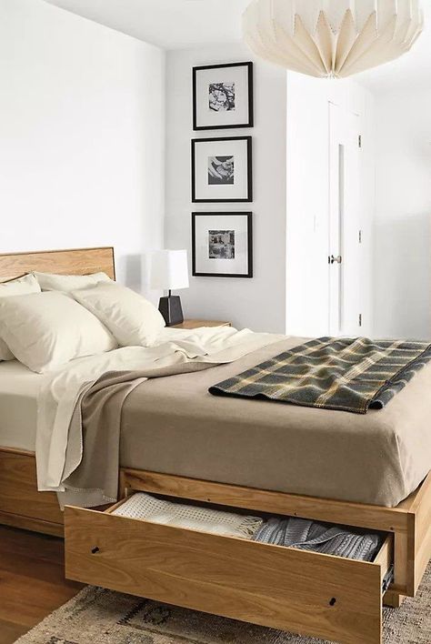 Discover the best storage beds to buy now for an organized and streamlined space. From elevated beds to pull-out drawers, rest easy knowing your items are out of sight. A bed with hidden storage is the perfect solution for small bedrooms and cramped studio apartments.#bedroomdecorideas #homedecorideas #cozybedding #marthastewart Best Storage Beds, Beautiful Bed Designs, Bed Bases, Bed Frame Design, Wooden Bed Design, Bed Design Modern, Bed Storage Drawers, Bed Furniture Design, Bedroom Bed Design