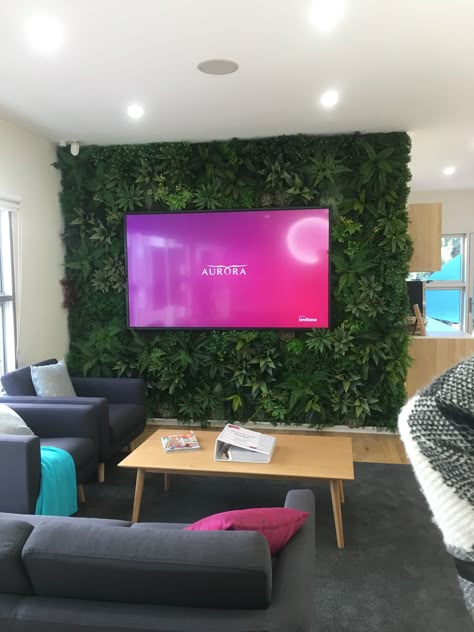 Fake Plant Tv Wall, Turf Wall Tv, Ivy Wall Behind Tv, Beauty Room Grass Wall, Artificial Grass Wall Tv Unit, Basement Gym, Sales Office, Tv Wall Design, Tv Wall