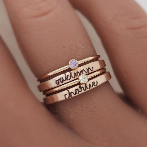 Mother's Day Gift | The Hannah Set This set includes: -Two 14k gold filled or .999 fine silver 2mm personalized rings in our handwriting font -Two 14k gold filled or sterling silver birthstone rings *If you only need 1 of each ring, please use this listing:  https://www.etsy.com/listing/1678500446/mothers-day-gift-cursive-stacking-name?click_key=e92aee2a3d2032f0ebc699c8fe543638ae6ac480%3A1678500446&click_sum=88f2943e&ref=shop_home_active_7&pro=1&frs=1 The Hannah Set is the perfect gift for Mothe Name Rings Personalized, Unique Mothers Rings, Mothers Jewelry, Mothers Rings, Stackable Name Rings, Sterling Silver Birthstone Ring, Rings Personalized, Handwriting Gifts, Handwriting Jewelry