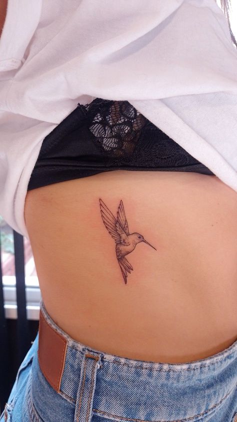 #tattoo, #tattoos, #inked, #tattooart, #tattooedwomen, #tattooedguys, #tattooinspiration, #tattooideas, #tattooworldwide, #tattoosociety, #InkLaughs, and #TattooFails​ Humming Bird Spine Tattoo, Hummingbird Bird Tattoo, Rib Hummingbird Tattoo, Hummingbird Matching Tattoo, Hummingbird Tattoo Upper Arm, Hummingbird Tattoo Ribs, Hummingbird Rib Tattoo, Delicate Hummingbird Tattoo, Humming Bird Tattoos For Women