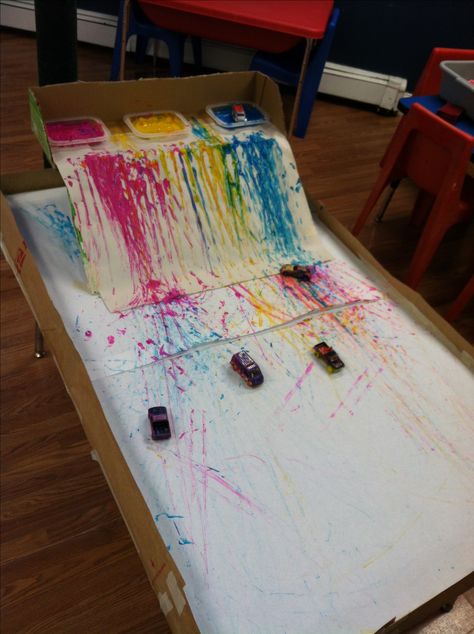 Explore mark making and colour by racing vehicles through the paint. I did this with cars on our old slide. Encouraged more boys to "paint" that day :) Recycled Material Art, Transportation Preschool, Outfit Hiking, Nursery Activities, Transportation Theme, Kids Create, Inspire Creativity, Toddler Art, Preschool Art