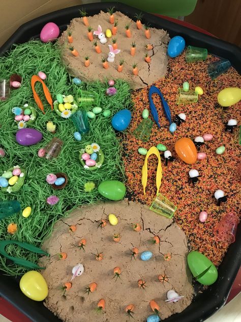 Easter tuff tray play Easter Tuff Tray Ideas For Babies, Tuff Tray Easter, Spring Tuff Tray Ideas For Toddlers, Easter Tough Tray Ideas, Spring Tough Tray Ideas, Reggio Easter Ideas, Easter Sand Tray Eyfs, Easter Provocations, Easter Themed Tuff Tray