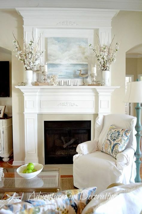 Gorgeous Coastal Great Room! The mantle and trim around the fireplace is incredible Mantelpiece Ideas, Coastal Mantle, Spring Mantle Decor, Spring Mantel Decorating Ideas, Summer Mantel, Spring Mantle, Mantle Ideas, Fireplace Mantle Decor, Summer Mantle