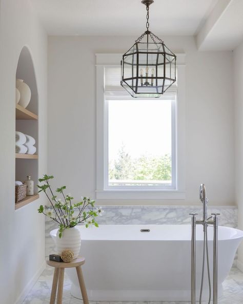 Mixed metals for depth and interest, pretty natural materials for that organic touch. Happy weekend! 😀 From our #nicestfolksinsherwoodproj Niche Behind Freestanding Tub, Freestanding Tub Decorating Ideas, Tub Decorating Ideas, Arched Niche, Bathroom Niche, Suite Bathroom, Primary Bathroom, Boutique Interior Design, Farmhouse Master