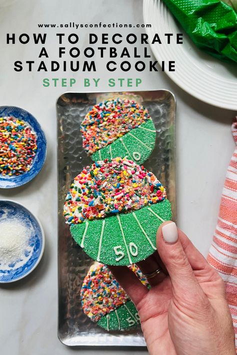 This picture shows a fully decorated cookie that looks like a football stadium. Football Themed Cookies Decorated, Football Cookies Decorated Buttercream, Football Stadium Cookies, Football Stadium Cookies Decorated, Football Season Decorated Cookies, Football Play Cookies Decorated, Football Cookies, White Icing, Cookie Dough Recipes