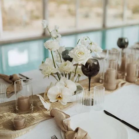 A white orchid centerpiece with white roses at a wedding. White Orchid Centerpiece, Orchid Centerpieces Wedding, Sweetheart Table Centerpiece, Orchid Centerpieces, Sunflower Wedding Bouquet, Tall Wedding Centerpieces, Orchid Bouquet, Small Centerpieces, Tree Centerpieces