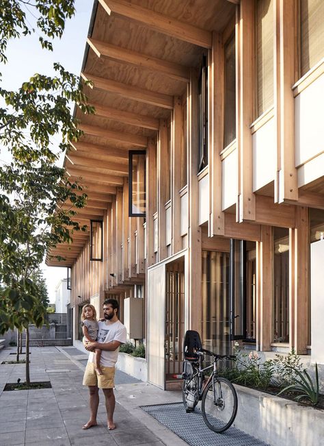 San Crescente Houses by Christián Izquierdo - Dwell Trees Front Yard, Bush Retreat, Parking Lot Architecture, Raised Planters, Project Architecture, Coffee Place, Wood Facade, Multifamily Housing, Wooden Facade