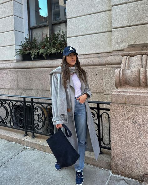 Easy outfit with jeans, a trench coat, and sneakers. Winter in nyc, style inspo, adidas gazelle, celine hat, grey long coat Trench Coat And Sneakers, Grey Trench Coat Outfit, Winter Nyc Outfits, Celine Hat, Winter In Nyc, Building A Wardrobe, Outfit With Jeans, Long Grey Coat, Winter Nyc