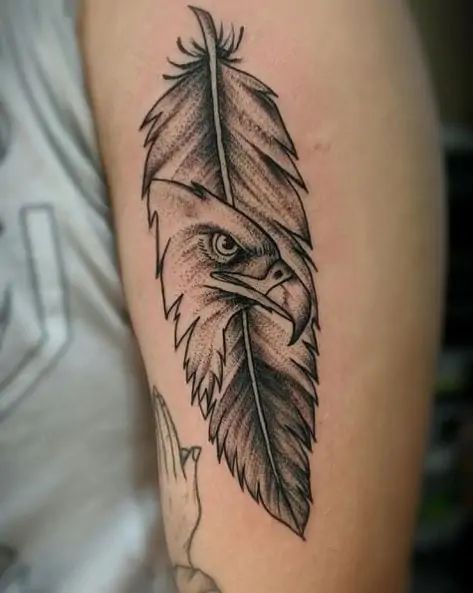 The Eagle Tattoo Meaning And 115+ Soaring Eagle Tattoos Feather Pen Tattoo, Feather Tattoo For Men, Phoenix Feather Tattoos, Eagle Feather Tattoos, Bald Eagle Tattoos, Feather Tattoo Colour, Inspiring Tattoos, Feather Tattoo Meaning, Men's Tattoos