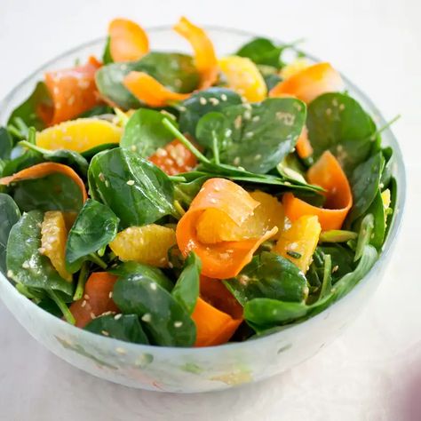 Spinach Salad with Carrot, Orange, and Sesame | Cook's Illustrated Napa Cabbage Slaw, Avocado Food, Cooks Illustrated Recipes, Pile Of Leaves, Mayo Salad, Easy Mac And Cheese, Spinach Salad Recipes, Illustrated Recipes, Super Salads