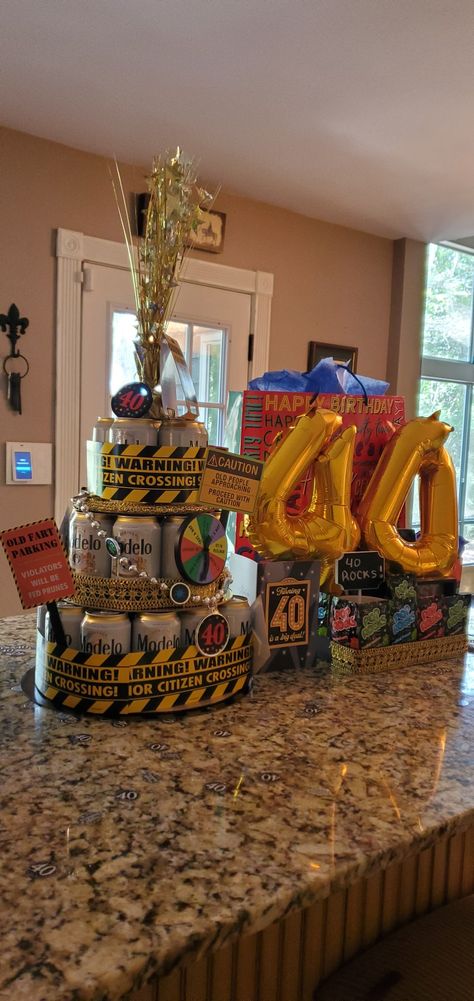 40th birthday diy beer can cake 40 Year Old Cake For Men, Beer Cakes For Men Birthday, 40th Bday Cakes For Men, 40th Birthday Cake For Men My Husband Dads, 40th Birthday Cakes For Men Turning 40 Funny, 40th Birthday Cakes For Men Beer, Birthday Beer Tower, Beer Cake Tower For Men, Beer Cakes For Men