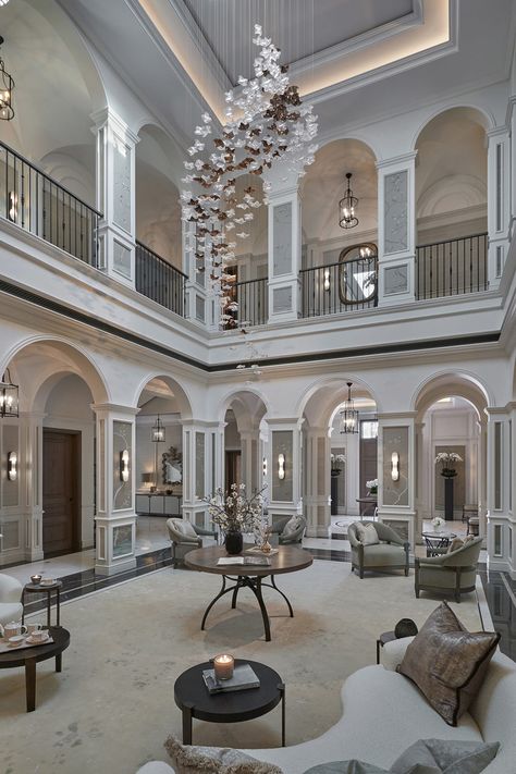 Sand & Sea adds a modern alternative to a traditional chandelier in this luxurious Gulf interior by Sophie Paterson Interiors. Gold and clear crystal ripples cascade from the skylight into the atrium below. A sculptural installation achieved by a bespoke hanging solution created by the Haberdashery design team. Sophie Paterson Interiors, Fancy Living Rooms, Sophie Paterson, Key Lighting, Sand Sea, Mansions Homes, Traditional Chandelier, Luxury Lighting, Big Houses