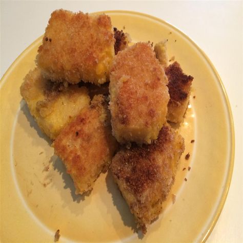 Panko-Breaded Fried Grits Cakes Fried Grits Cakes, Grits Cakes, Grit Cakes Recipe, Fried Grits, Shrimp And Cheese Grits, Grit Cakes, Breakfast Alternatives, Grits Recipe, Cheese Grits