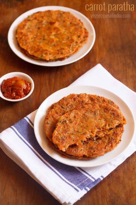 Carrot paratha recipe - Healthy and delicious whole wheat parathas made with carrots.  #paratha #carrots Carrot Indian Recipe, Carrot Paratha Recipe, Carrot Recipes Indian, Grated Carrot Recipes, Indian Carrot Recipes, Indian Breads, Paratha Recipe, Flat Breads, Tiffin Box