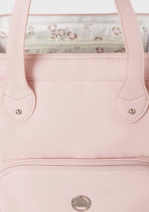 The Mayoral Backpack Diaper Bag in Rosa color combines style and functionality, featuring secure zipper closure, durable polyurethane exterior, and easy-to-clean polyester lining. Measuring 8.7" x 14.6", it includes a foldable changing mat, making it perfect for on-the-go parents. Elevate your parenting essentials with this chic and practical accessory!