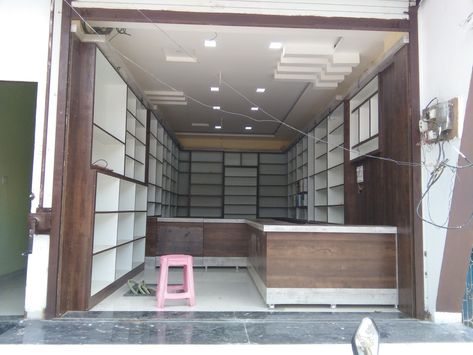 Kirana Shop Interior Design, Kirana Shop Counter Design, Kirana Store Design Counter, Fancy Store Interior Design, Kirana Store Design, Cosmetic Shop Design Ideas, Space Saving Furniture Tiny Houses, Store Counter Design, Wooden Shelf Design