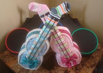 #Baby Shower #Twins #Diaper Guitars #Blue Guitar #Pink Guitar #Rock and Roll Baby Shower Twins, Glitter Gender Reveal, Pink Guitar, Blue Guitar, Gender Reveal Ideas, Reveal Ideas, Reveal Party, Baby Party, Reveal Parties