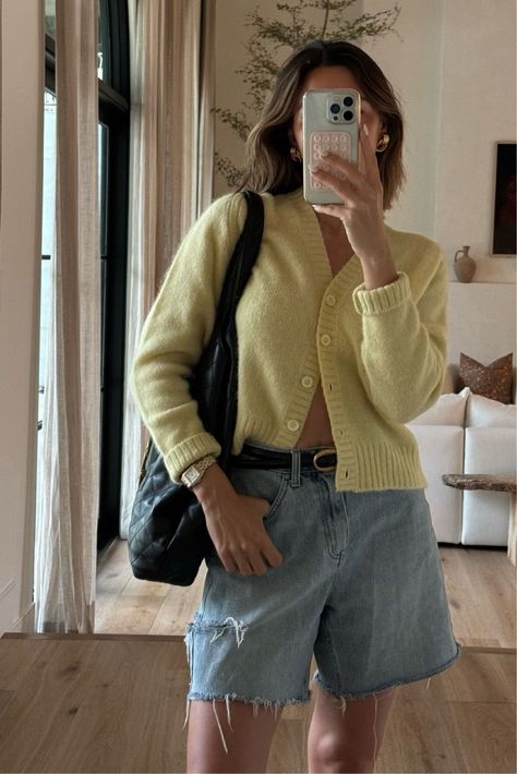 looking for summer outfit ideas with a pop of color? then tap to shop this trendy summer outfit! I'm loving this butter yellow knit cardigan, oversized denim cut offs, black belt, and black tote bag for summer. tap to check out my ltk to shop this trendy summer outfit and find more casual everyday outfit ideas for summer. Denim Shorts Cardigan Outfit, Denim Shorts Outfit Fall, Shorts And Cardigan Outfit, Yellow Black Outfit, Orange Cardigan Outfit, Yellow Cardigan Outfit, Butter Yellow Outfit, Fall Shorts Outfit, Women Cardigan Outfit